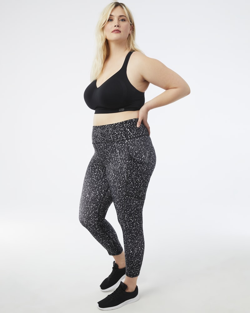 Plus size model with hourglass body shape wearing Magda Printed Cropped Leggings by Marika | Dia&Co | dia_product_style_image_id:157521